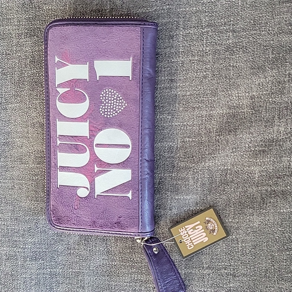 Juicy No 1 large purple brand new wallet with mild blemish